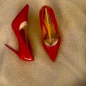 Brand New size 8 Sexy Red runs small